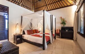 Home exchange in Ubud, Bali, second bedroom with canopy bed and desk