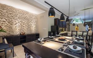 Home exchange in Ubud, Bali, dining table next to piano