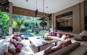 Home exchange in Ubud, Bali, large seating area open to garden & pool