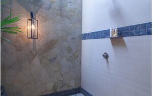 Home exchange in Ubud, Bali, open shower in family room bathroom
