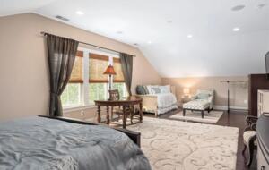 Large bedroom with bonus sitting area