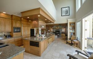 Open chef's kitchen with massive island