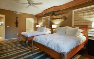 Home Exchange in Kahuku, HI, spacious guest bedroom with two queens