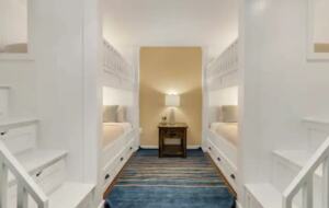 Home Exchange in Kahuku, HI, bunk room with four twin XL beds