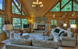 Home Exchange in Mineral Bluff, GA, living room with stone fireplace