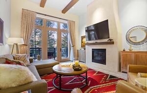 Home Exchange Taos Ski Valley, NM fireplace with high ceilings