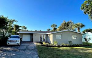 Home Exchange in Naples, FL one story home with covered parking