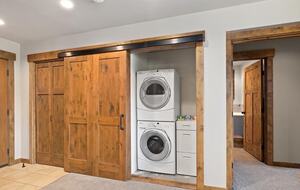 Home Exchange in Cle Elum, WA, barn doors open to laundry closet