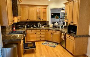 Home Exchange in Virginia Beach, VA kitchen with a TV view