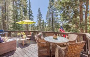 Home Exchange in Truckee, CA, front deck overlooking luscious trees