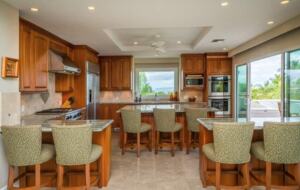 Open chef's kitchen with multiple eat-in bars