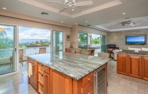 Open chef's kitchen open to balcony