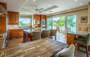 Open chef's kitchen open to balcony