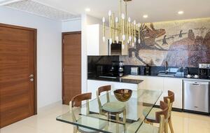 Home exchange in Los Cabos at Garza Blanca Resort, glass dining table