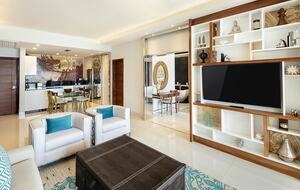Home exchange in Los Cabos at Garza Blanca Resort, living room with TV