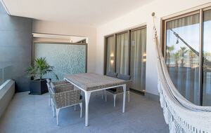 Home exchange in Los Cabos at Garza Blanca Resort, balcony table
