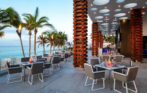 Home exchange in Los Cabos at Garza Blanca Resort, outdoor dining