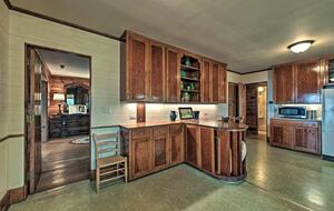 The kitchen also offers a bar for enjoying drinks or snacks!