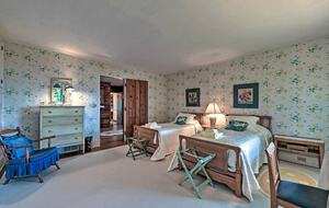 Side-by-side twin beds on the main level