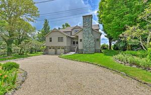 Parking for 5 vehicles is provided in the driveway