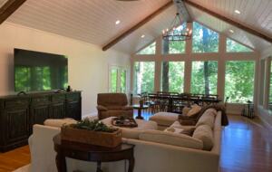 Home Exchange in Winchester, TN family room with wood beam ceilings