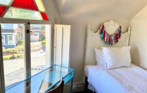 Home Exchange in Pacific Grove, CA, twin bed with ocean view and desk