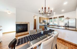 Home Exchange in Fraser, CO formal dining room with fireplace