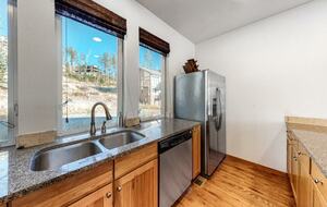 Home Exchange in Fraser, CO kitchen with a view and stainless steel