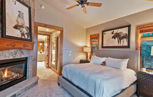 Home Exchange in Steamboat Springs, CO master bedroom #1 w fireplace