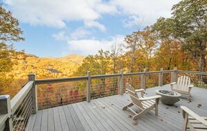 Home exchange in Fairview NC, deck with Adirondack chairs and fire pit