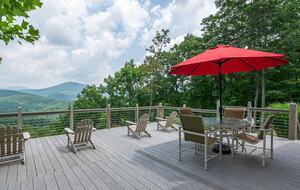 Home exchange in Fairview NC, deck with Adirondack chairs