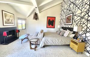 Home Exchange in Oxnard, CA spacious master bedroom with fireplace