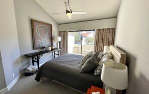 Home Exchange in Oxnard, CA guest bedroom with private patio