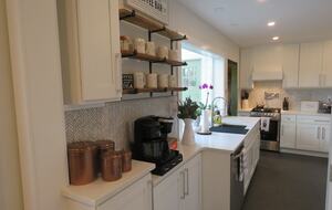 Home Exchange in Hillsdale, NY open shelving and a coffee counter