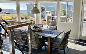 Views of fairway, Doran Beach and open seas at dining room.