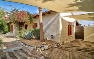 Home Exchange in Palm Springs, CA paved and covered driveway