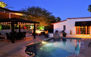 Home Exchange in Palm Springs, CA night time pool view