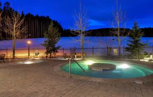 Hot tubs adjacent to fitness center and sauna