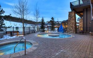Hot tubs adjacent to fitness center and sauna