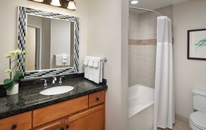 Home Exchange in Pam Desert, CA full bathroom with tub or shower