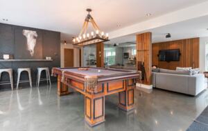 Lower level bar, pool table and den