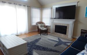 Home Exchange in Sea Isle City, NJ fireplace and large flat screen