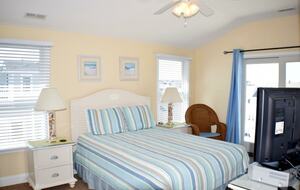 Home Exchange in Sea Isle City, NJ master bedroom with patio