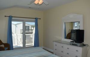 Home Exchange in Sea Isle City, NJ master bedroom with patio access