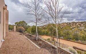 Bocce court and fenced in area for dogs.