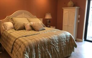 Master bedroom with sliding doors to pool