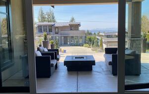 Home Exchange in Vancouver, BC, Canada fire pit with water views