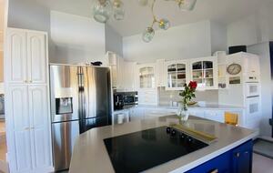 Kitchen with Top Appliances and Electric Glass Top Stove