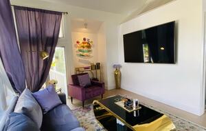 Media Room with 75 Inch Flat Screen TV