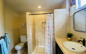 Full Bathroom with Double Walk In Shower
